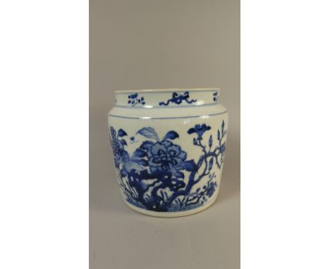 An Early Chinese Blue and White Cylindrical Pot with Painted Scenes Depicting Seated Figures Listening to Musician and a Flor