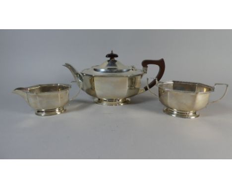A Silver Three Piece Tea Service, Each Piece Monogrammed 'R', by Adie Brothers, Birmingham 1932, 957gms