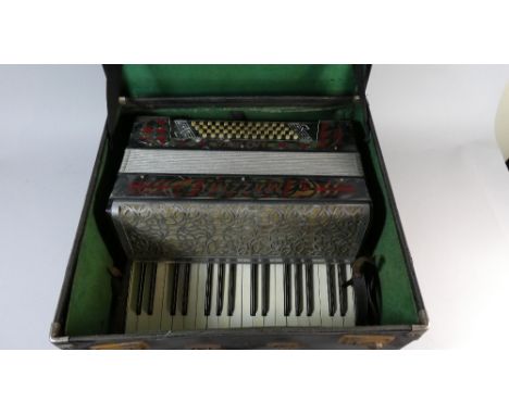 A Cased German Piano Accordion, the Mazzini Antoria in Leather Carrying Case