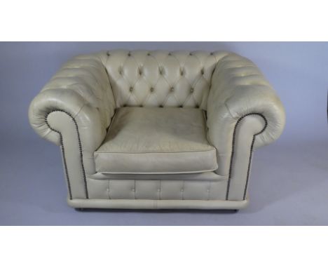 A Button Upholstered Cream Leather Armchair