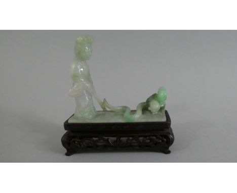 A Carved Oriental Jade Figure Group, Possibly Guan Yin with Snake, Set on Carved and Pierced Wooden Stand, 9cms Long (Tail AF