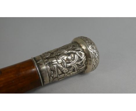 A 19th Century Malacca Walking Stick with White Metal Mount Worked to Depict Scholars in an Outdoor Setting. 86cm Long.