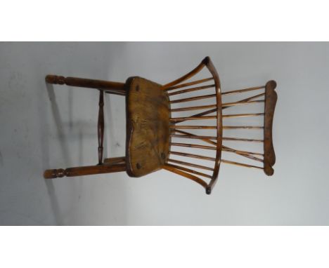 An Early 19th Century Elm Seated Stick Back Windsor Armchair with 'H' Stretcher 