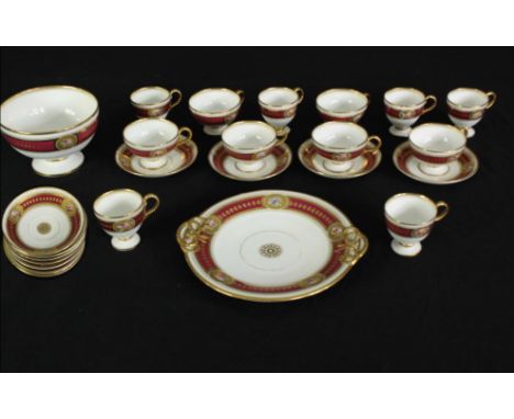 A 19th century porcelain tea service with diamond registration marks to base. Dia.27cm. (largest) 