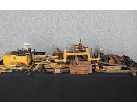 An extensive collection of vintage woodworking tools. L.47cm. (largest). 