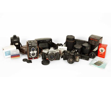 A Yashica-Mat, EM, half-plate camera, two other cameras, various lenses, flashguns, filters etc.