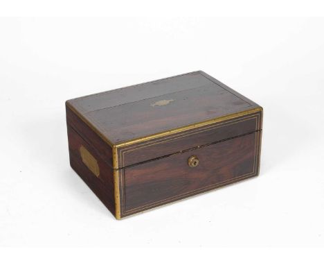 A Victorian rosewood dressing case, I. Turrill dressing and writing case maker, 250 Regent street, with brass mounts and coun