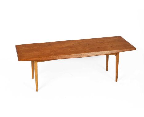 Trevor Chinn for Gordon Russell Limited circa 1960A mid Century 'Long Tom' teak coffee table, the rectangular top with the lo
