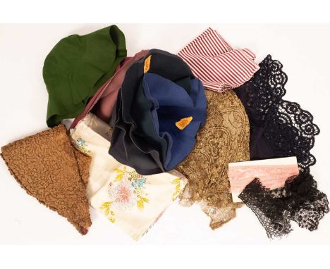 A large quantity of textiles, linens and lace to include tablecloths, lace fragments, pairs of bloomers, an unfinished blouse