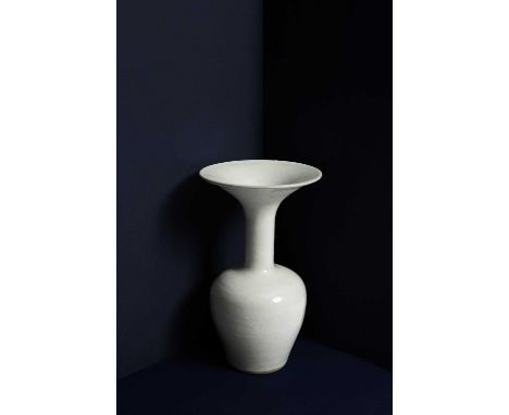 ARR Dame Lucie Rie (1902-1995) a stoneware vase with flared rim and tapering neck in white glaze, impressed seal mark, 26.5cm