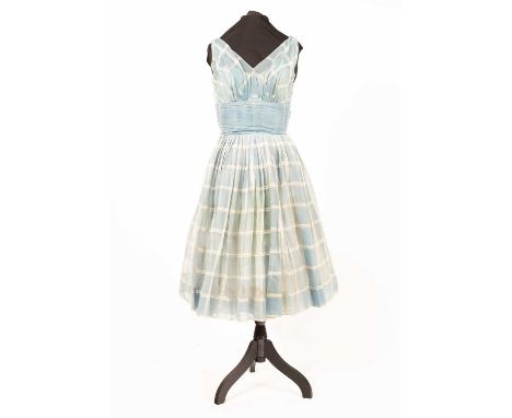 A 1950/60s blue chiffon check dress with bow back, a 1960s lemon yellow mini dress with chiffon pleated sleeves, a white lace