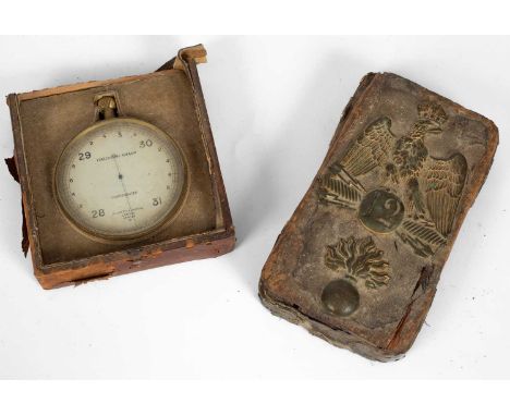 A doorstop of regimental interest, 20cm x 12cm and a compensated Forecasting Aneroid barometer by Negretti &amp; Zambra, Lond