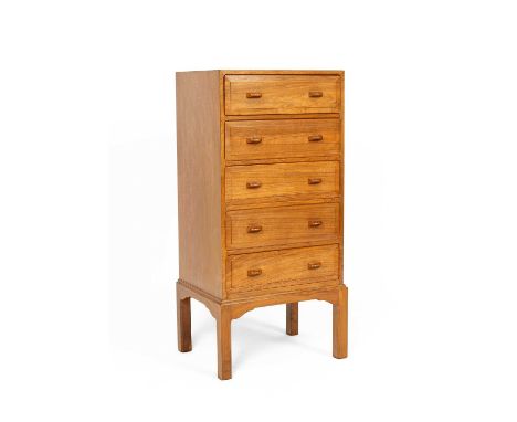 Dennis French, a Cotswold Arts &amp; Crafts walnut chest of five drawers, of small proportions, on bracket feet, 47cm wide, 3