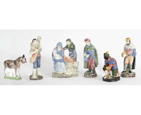 Six Rye pottery figures from the Nativity, the largest figure 26cm high and the smallest figure 20cm high, dated from 2000-20