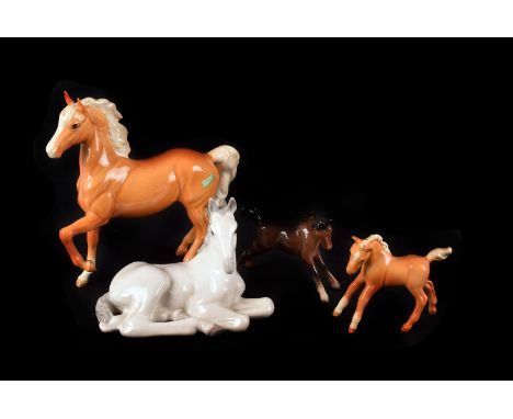 A Collection of Ceramic Horses, mostly Beswick, including  foals and a beagle dog, some damage to legs on two horses, AF (10)