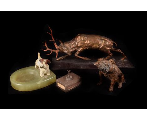 An Art Deco cold painted dog and marble ashtray, together with a spelter figure of a bulldog, a spelter spaniel, two mounted 