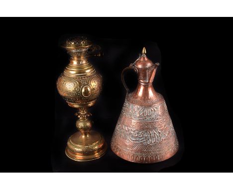 A Large Messengers Table oil lamp, in brass ,43cms high with swirling pierced design and glass chimney together with a lidded