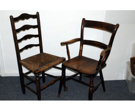 A late Victorian rush seated ladder back chair, together with a Victorian hardwood captains style chair (2)