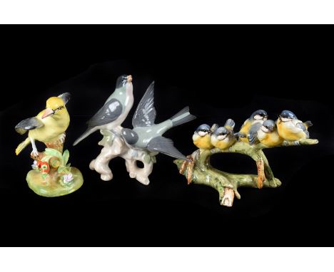 A collection of Ceramic Birds, including early Beswick, Kingfisher, Magpie, Barn Owl,  Bullfinch, Grey Wagtail and more .