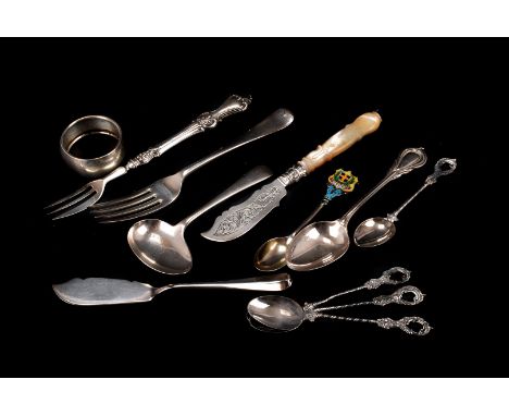 A collection of Georgian & Victorian and later silver flatware and serving utensils, including a mop handled butterknife by G