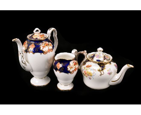 A Mixed floral part tea service, mostly of a blue floral and gilt decoration with items from both Royal Albert Crown china an