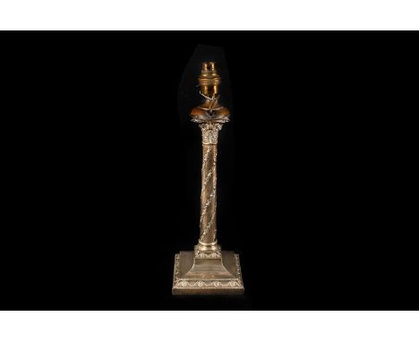 A late Victorian silver filled candlestick, now converted to a lamp base, in the form of a column with square base
