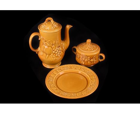 An extensive 1960s Royal Worcester pottery Crown Ware dinner service, all in honey coloured glaze, including plates, cups, go