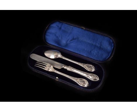 A Victorian silver Christening set by George Adams, comprising knife, spoon and fork with swag design to handles, in fitted c