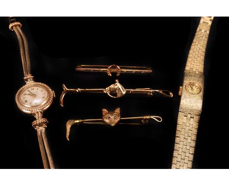 A 1950s Jaeger LeCoultre lady's 9ct gold wristwatch,  no. 7500, the small silvered  dial with raised gold detail and baton ha