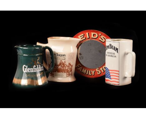 Three ceramic whisky water jugs,  Jim Beam, Teachers and Glenfiddich, together with a card  mounted 'Reid's Family Stout' wal