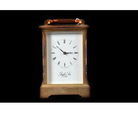 An Inglis & Son 'York Races' gilt metal carriage clock, with platform lever escapement, 13.5cm high