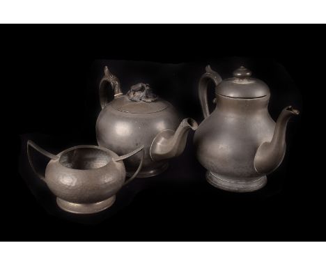 A Chinese copper and silver plated photograph frame, together with three various frames and four various pewter tea service i
