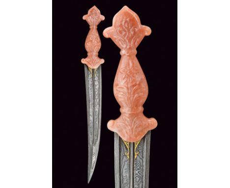 dating: Second part of the 20th Century provenance: India Curved, damascened, double-edged blade with grooves and fuller at t