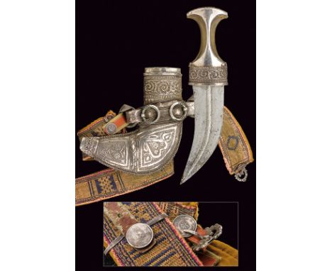 dating: circa 1900 provenance: Yemen Curved, double-edged blade with fuller at the center; horn grip with silver mounts, part