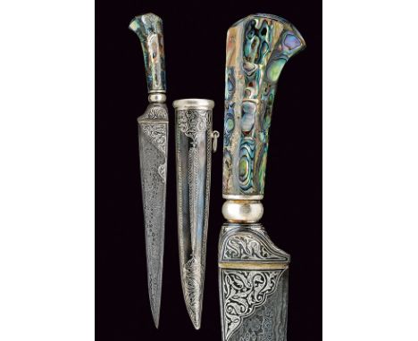 dating: Second part of the 20th Century provenance: India Straight, single-edged blade with damask structure, decorated with 