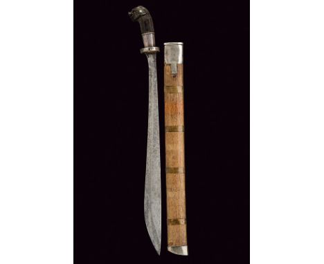 dating: 19th Century provenance: Indonesia Strong, single-edged blade, widening toward the tip; brown, horn grip, finely carv