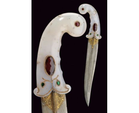 dating: Second part of the 20th Century provenance: India Curved, double-edged blade with raiser at the center and damask str