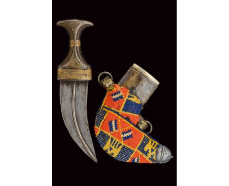 dating: circa 1900 provenance: Yemen Curved, double-edged blade with fuller at the center; horn grip with silver mounts, part