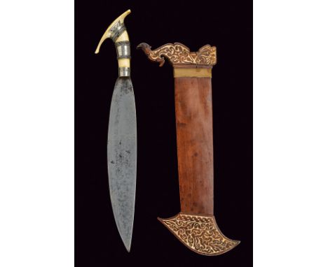 dating: 19th Century provenance: Borneo Wide, single-edged blade; ivory grip with silver mounts, partially engraved, pierced 