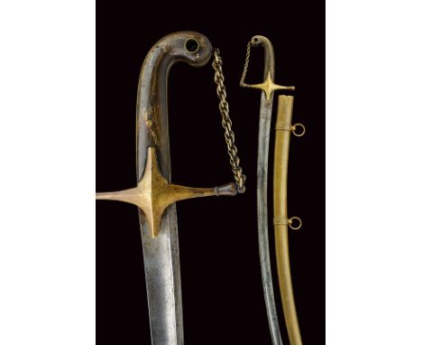 dating: circa 1800 provenance: France Curved, single-and double-edged blade with a widefuller at the center; hilt featuring c