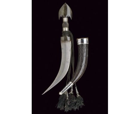 dating: mid-20th Century provenance: Arabia Curved, double-edged blade, ribbed at the center; massive, horn grip with pommel 