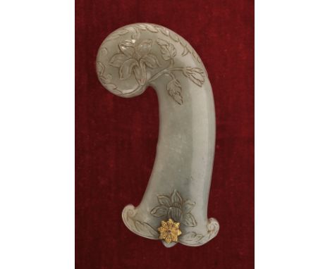 dating: 18th Century provenance: India Moghul Ma de of light green jade, featuring fine, floral engravings. The base with gil