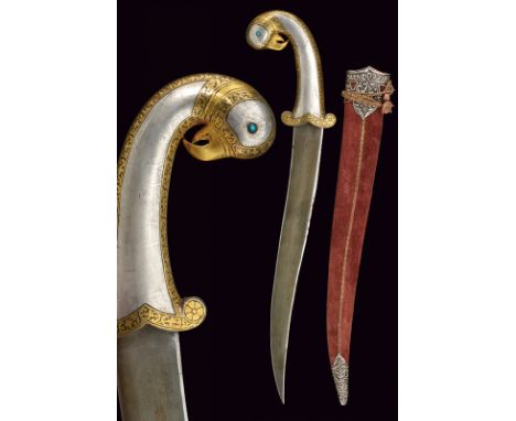 dating: first quarter of the 20th Century provenance: India Curved, flat, double-edged blade with damask structure; iron grip