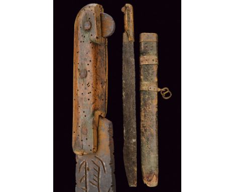 dating: 19th Century provenance: Tunisia Very heavy, wide blade with no edge, featuring deep writings in Arabic; grip with re