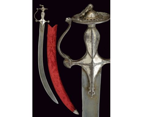 dating: 19th Century provenance: India Wide, curved, single-and false-edged blade with wide, damask fuller and tang; silver-p