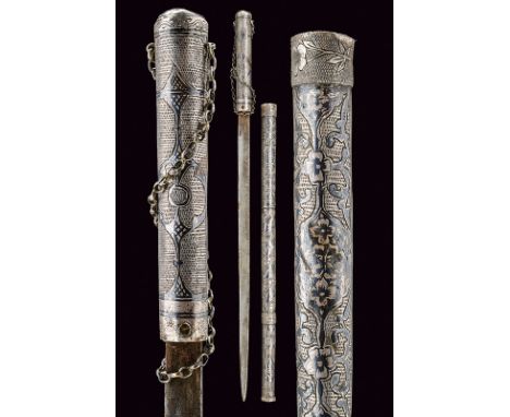 dating: 19th Century provenance: Caucasia Cylindrical, silver-plated grip and scabbard, engraved and nielloed with floral mot