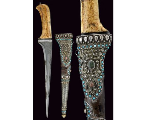 dating: 18th Century provenance: Indopersia Straight, single-edged, damask blade with "T"-back, engraved with floral motifs a