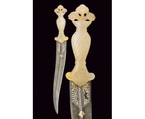 dating: Second part of the 20th Century provenance: India Curved, damascened, double-edged blade with fuller at the center, d