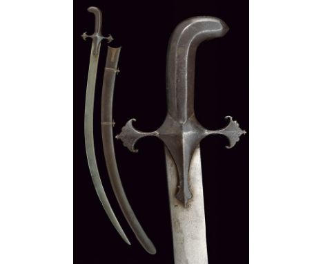 dating: 18th Century provenance: India Flat, fine, wootz damask, single-edged blade, small pitting from fighting; solid iron 