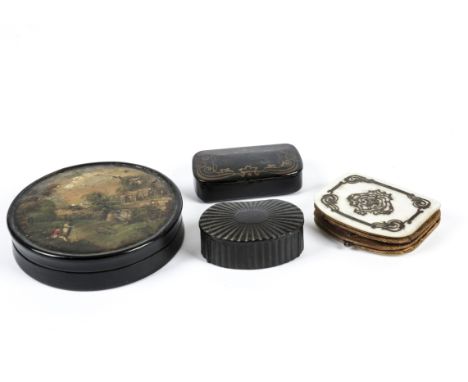 A Georgian papier mache circular box,   decorated with a romantic scene of Gentleman amidst overgrown ruins, inside are two h
